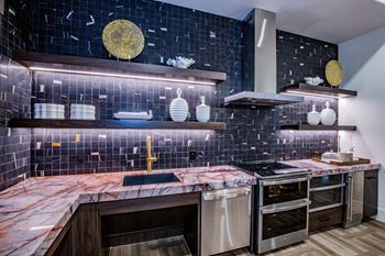 Centennial at the 5th apartments resident clubhouse kitchen